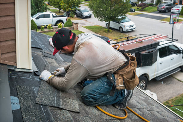 Professional Roof Replacement technician working in Weston, MA